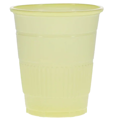 Yellow disposable plastic cup for medical or home care use, isolated on white background