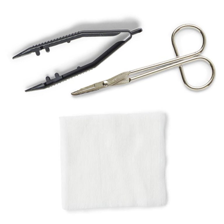 Medical tweezers, scissors, and gauze pad for home care and wound treatment supplies
