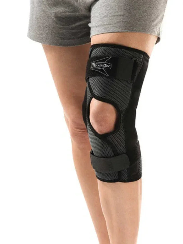 Adjustable knee brace support on leg, black medical knee stabilizer with open patella