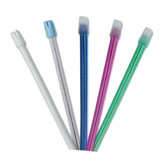 Set of five colorful medical suction tubes on white background, disposable dental tips