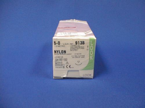 Nylon surgical sutures box 5-0 913B medical supplies on blue background