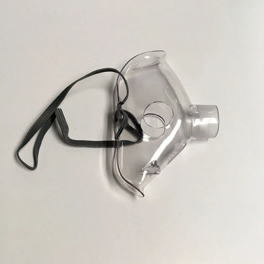 Clear plastic oxygen mask with elastic strap for respiratory care on white background