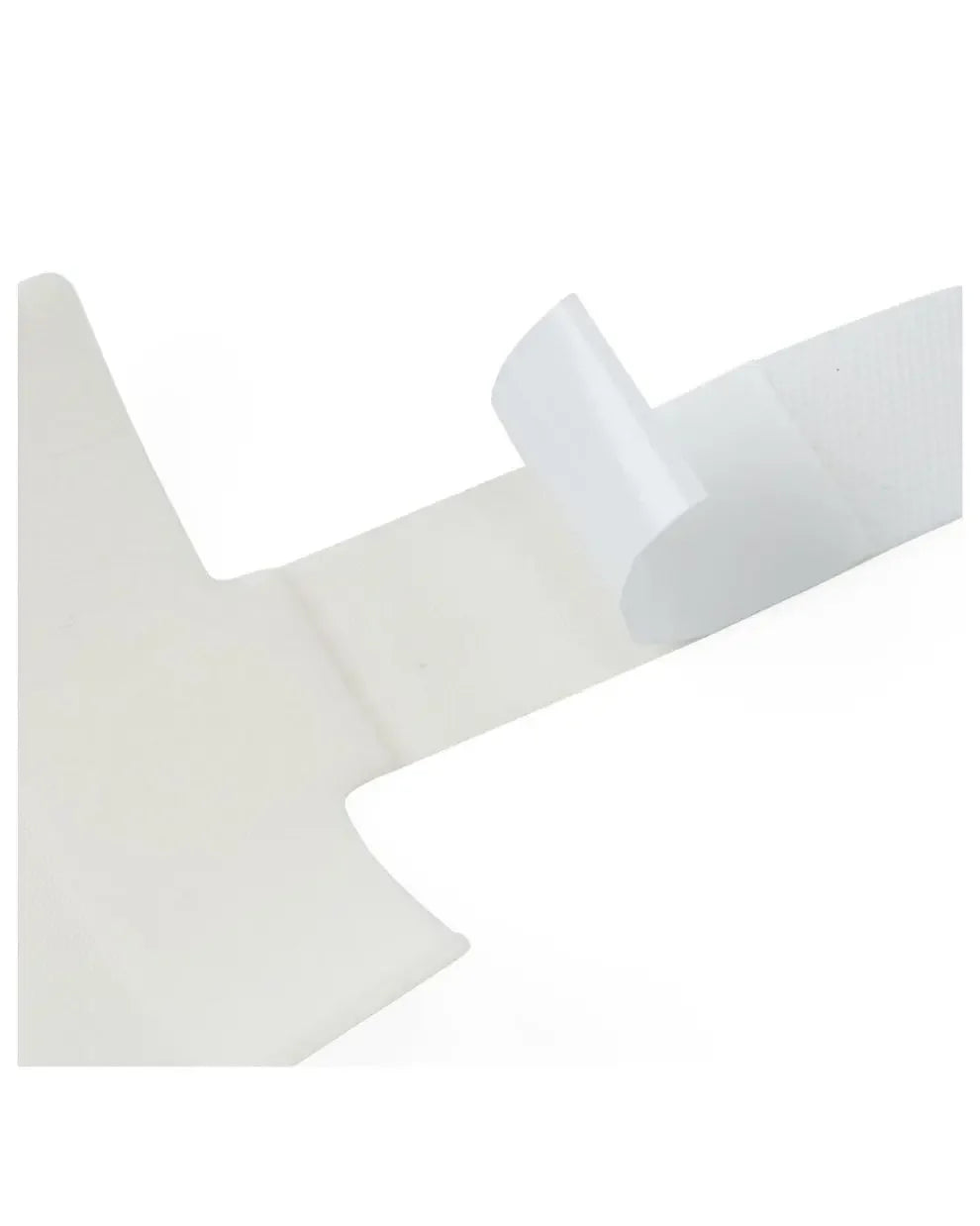 White adhesive medical tape roll on a plain background, wound care supply