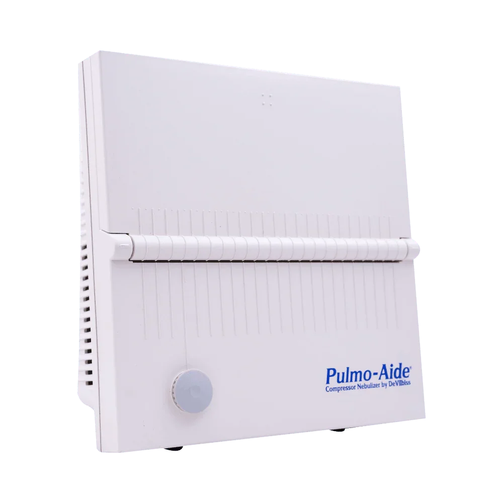 Pulmo-Aide compressor nebulizer medical device with white plastic case on blue background