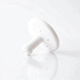 White plastic medical filter for respiratory or home care use on white background