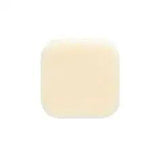 Square beige medical foam dressing pad on white background, wound care supply