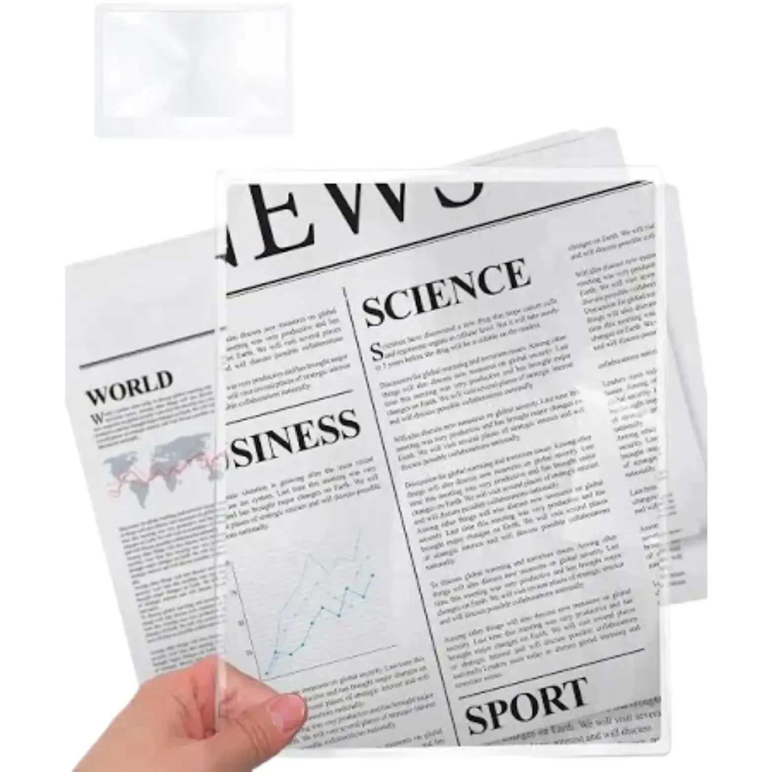 Hand holding a flexible rectangular magnifier sheet enlarging newspaper text