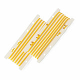 yellow elastic tourniquet bands on white dispenser for medical use