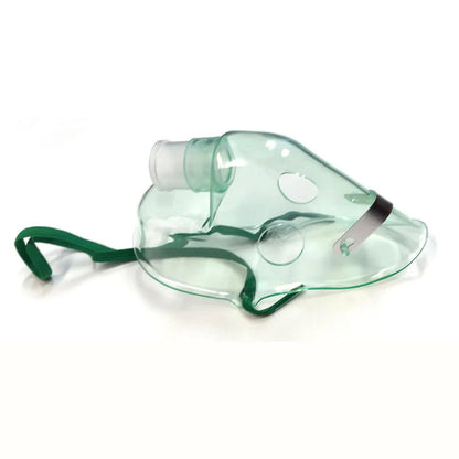 Clear adult oxygen mask with green elastic strap and tubing inlet on white background