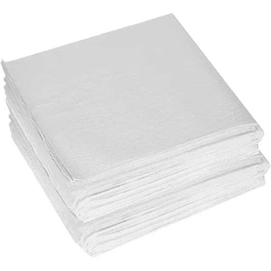 Stack of disposable white paper napkins for home care and medical use