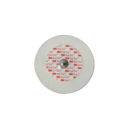 3M Red Dot round ECG electrode medical sensor with snap connector on white background