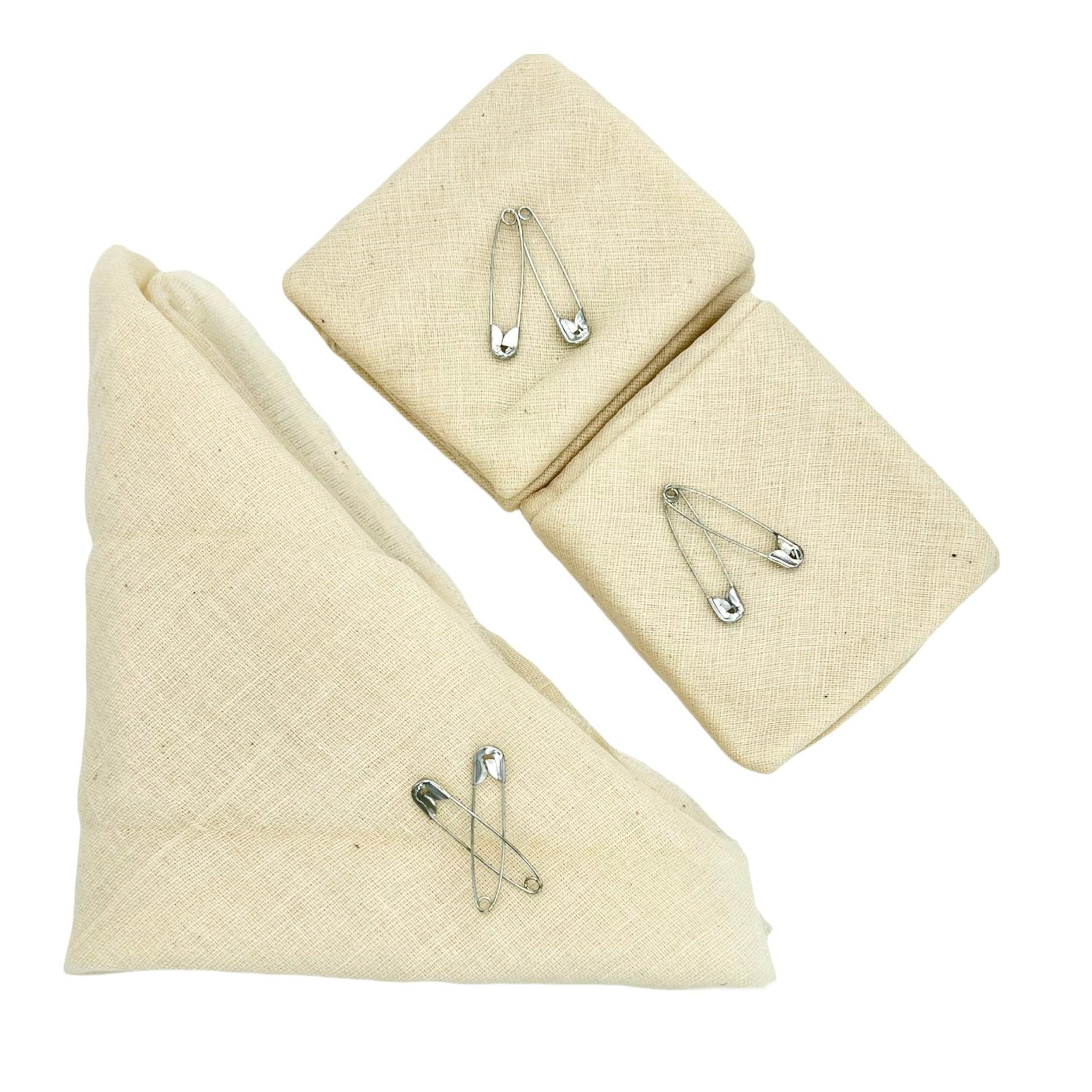 Triangular cotton bandages with safety pins for first aid and medical supplies