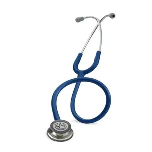 Blue medical stethoscope with silver chest piece on white background, home care supply