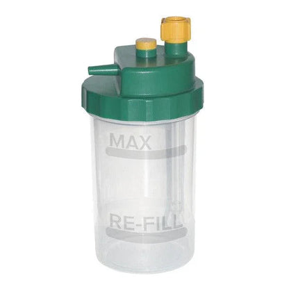 Oxygen humidifier bottle with green lid and yellow nozzles for respiratory therapy