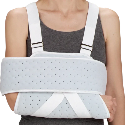 Person wearing a white medical arm sling shoulder immobilizer for injury support
