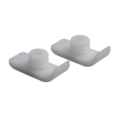 Pair of white plastic medical equipment accessories with threaded tops on a plain background