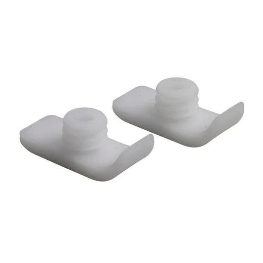 Pair of white plastic medical equipment replacement parts on white background