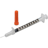 Medical syringe with clear barrel, measurement markings, and orange safety cap for home care