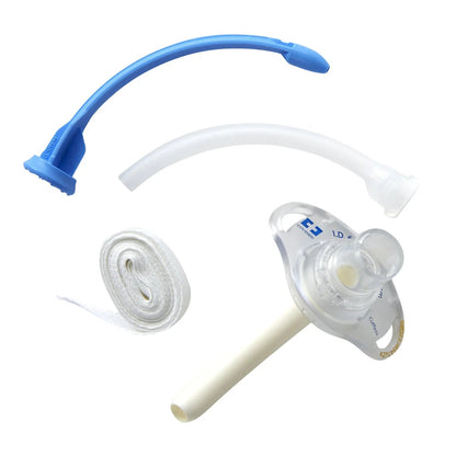 tracheostomy tube set with inner cannula, obturator, and securing strap on white background
