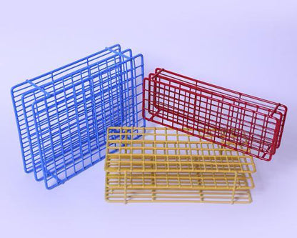 Colorful wire test tube racks for laboratory or medical supply use on a plain background