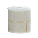 Medical gauze bandage roll with yellow guide line for wound care and dressing