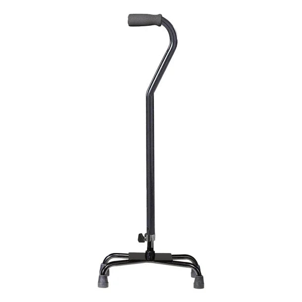 Black quad cane with ergonomic handle and four-prong base for mobility support