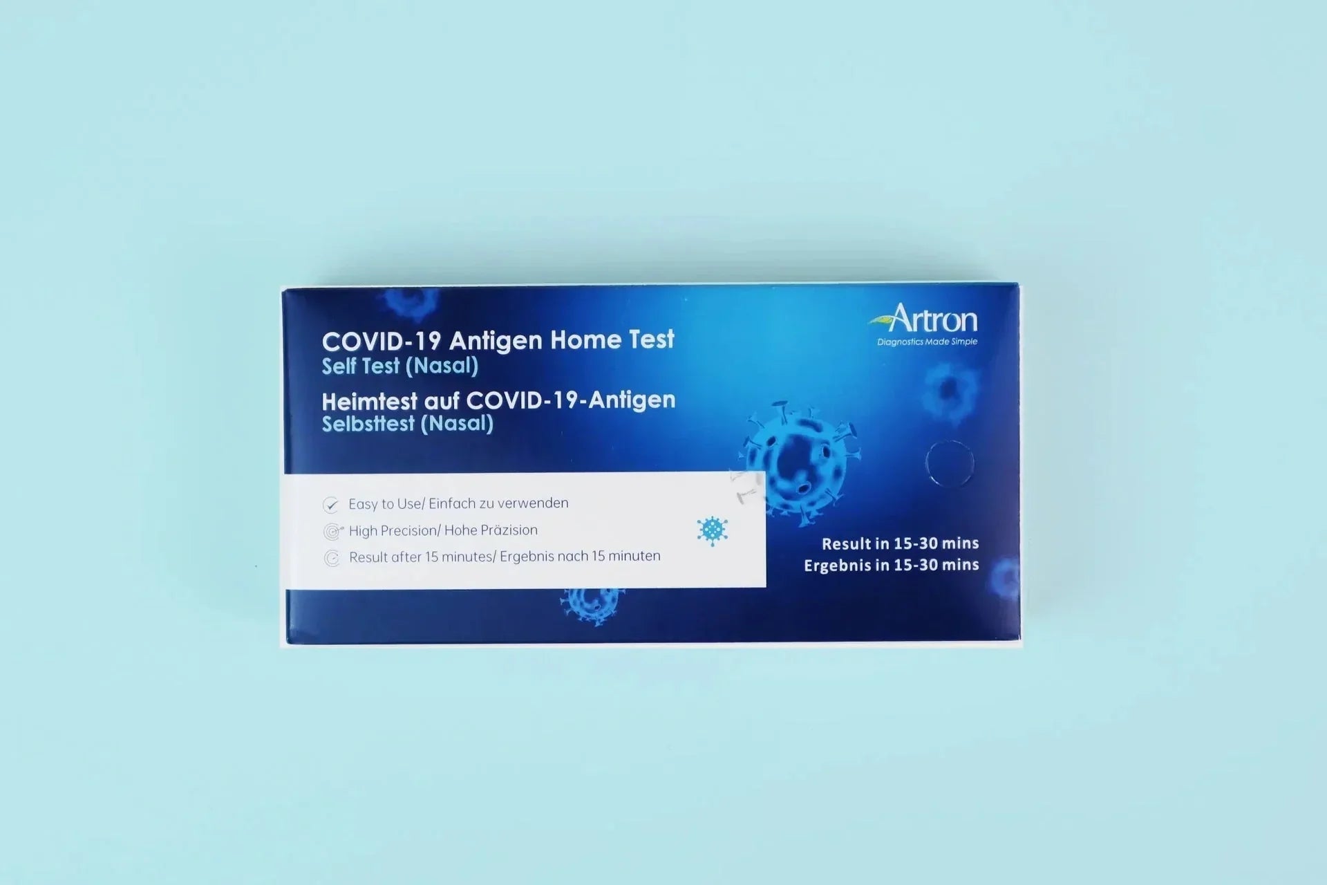 Artron COVID-19 antigen home self test kit box, nasal, blue background, rapid results