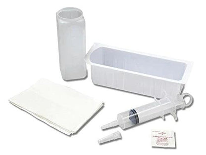 Irrigation kit with plastic syringe, container, tip, wipes, and absorbent pads for medical use