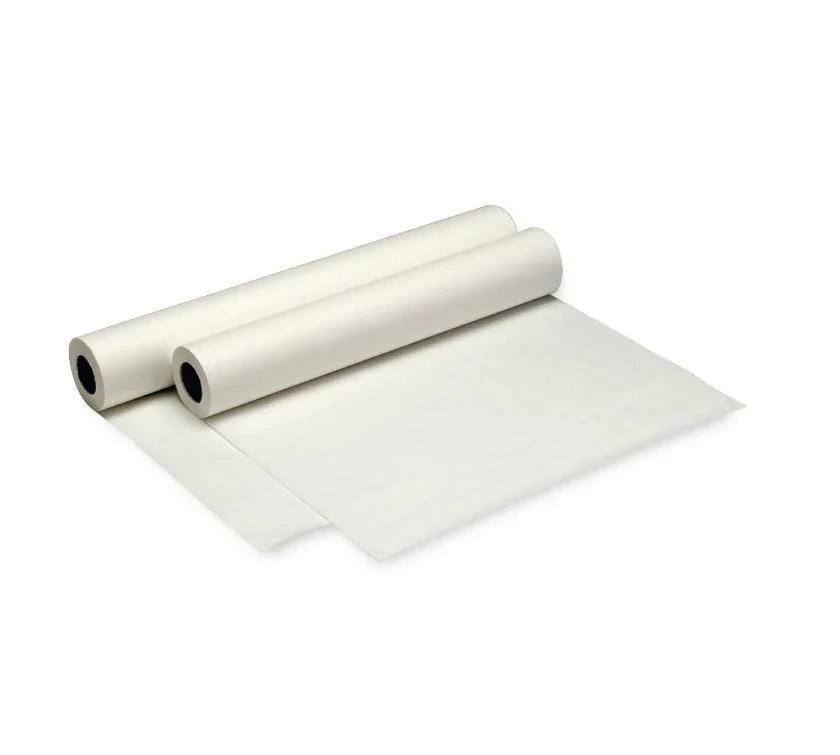 Two white medical exam table paper rolls unrolled on a white background
