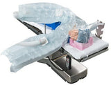 Upper body warming blanket system on hospital bed, patient covered for temperature management