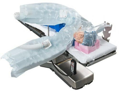 Upper body warming blanket system on hospital bed, patient covered for temperature management