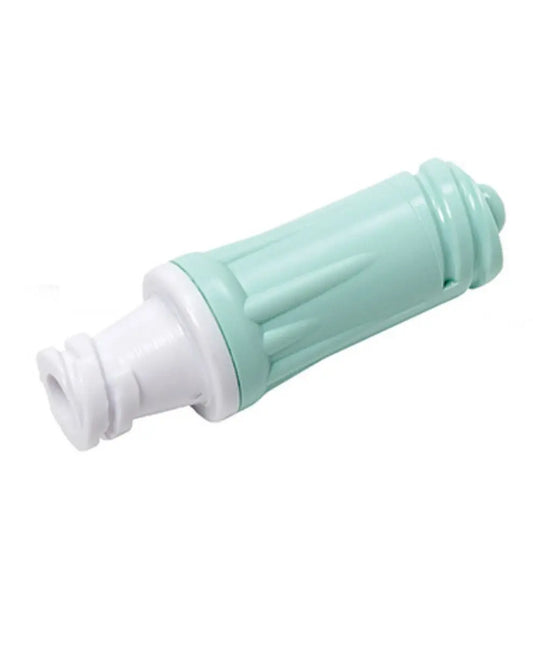Sterile green and white IV connector for medical tubing, close-up on white background