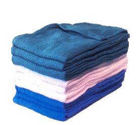 Stack of assorted blue and white microfiber cleaning cloths for medical or home care use
