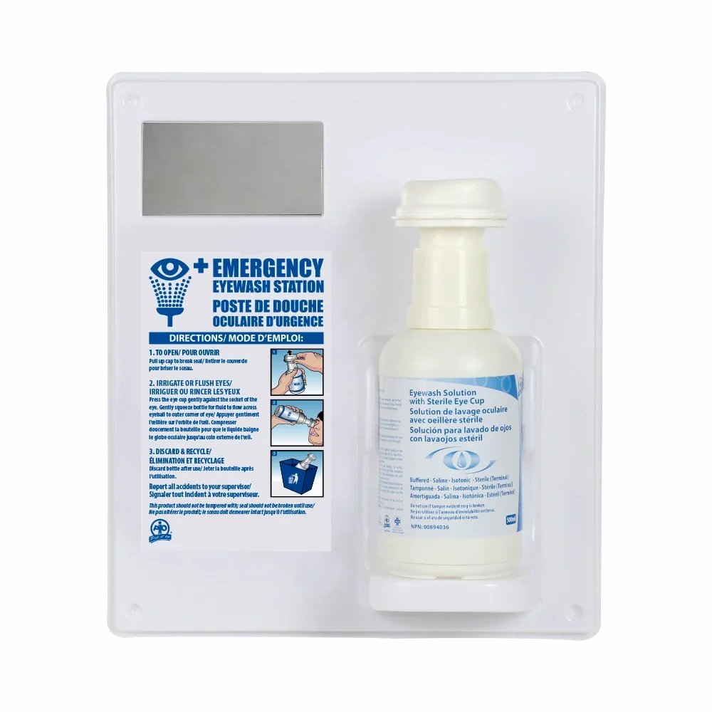 Wall-mounted emergency eyewash station with instructions and sterile eyewash solution bottle