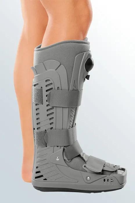 Medical walking boot on leg for foot and ankle injury support and protection