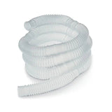 Corrugated clear medical respiratory tubing coiled on a white background