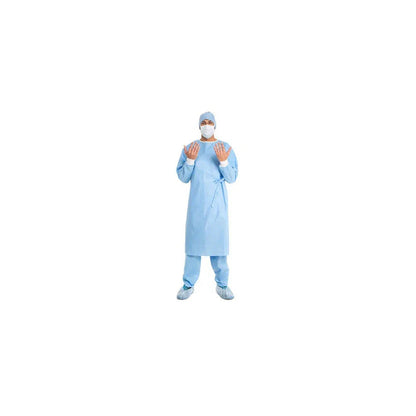 Medical professional in blue disposable surgical gown, face mask, cap, gloves, and shoe covers