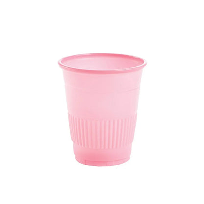 Pink disposable plastic cup with textured grip on white background