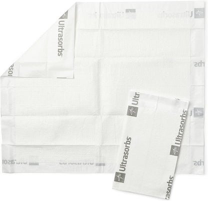 Disposable medical underpads with absorbent core, white, brand name Ultrasorbs visible