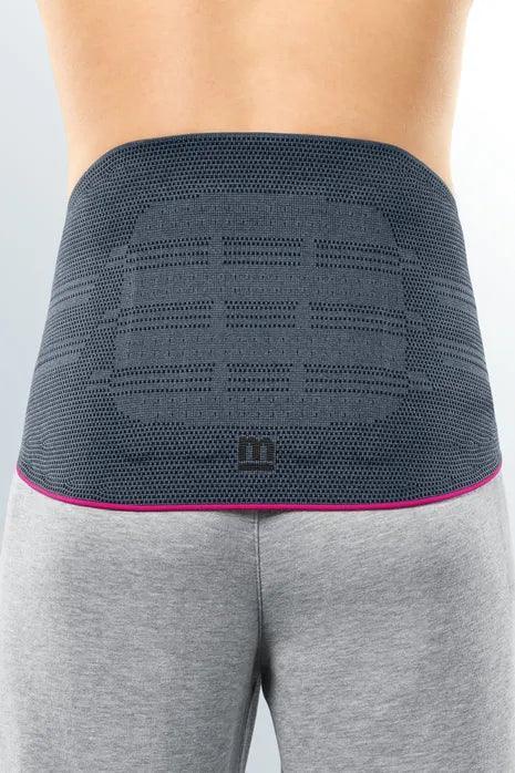 Medical back support belt worn on lower back for pain relief and lumbar support