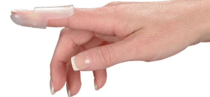 Hand wearing a transparent finger splint medical support for finger injury protection