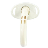 Curved medical tracheostomy tube with flanges and ventilation holes on white background