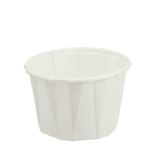 Disposable white paper medicine cup for medical or home care use