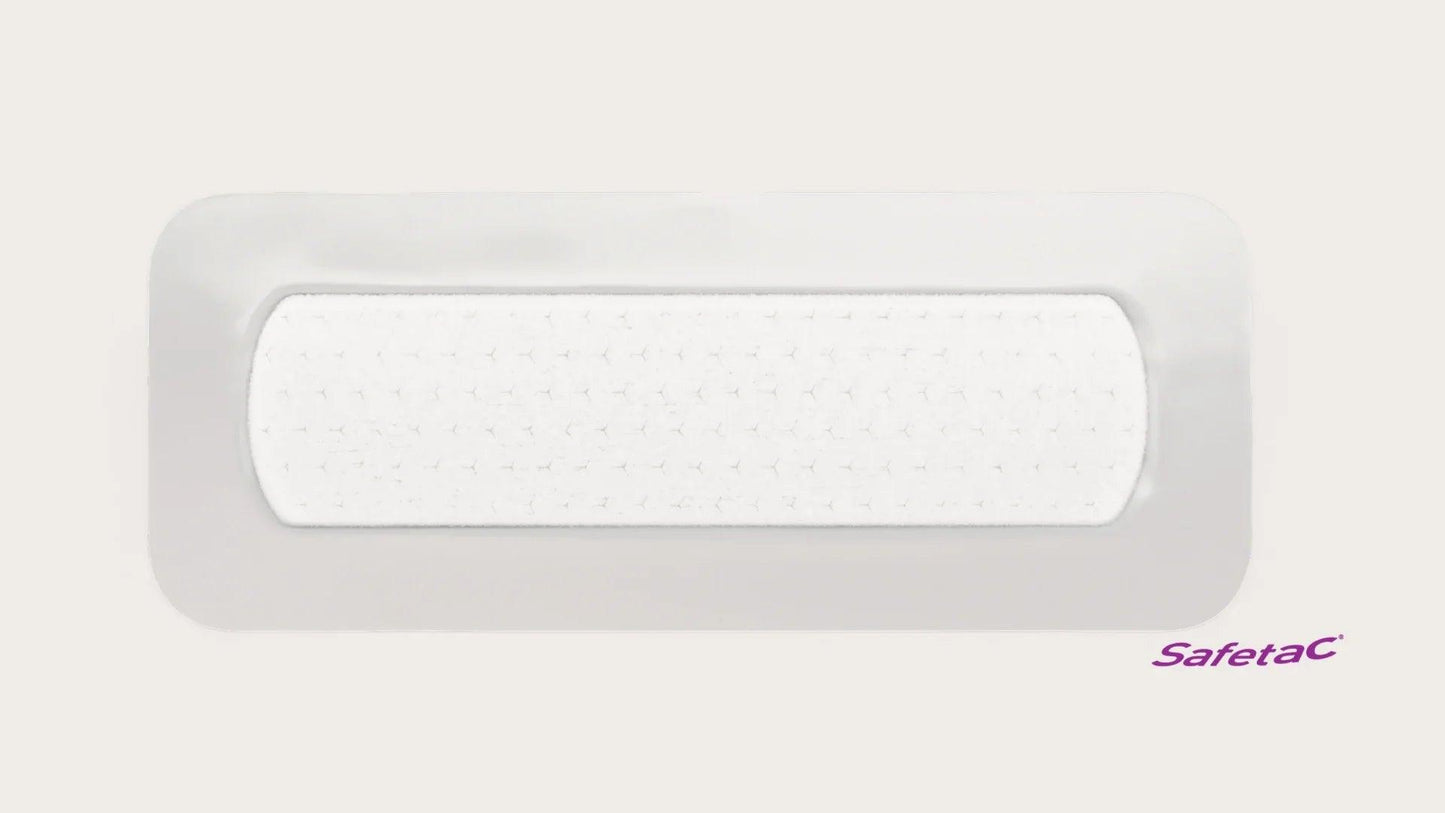 Rectangular medical silicone adhesive wound dressing with Safetac logo on white background