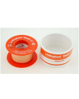 Leukoplast medical adhesive tape roll and empty plastic case, 2.5cm x 3m, on white background