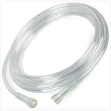 Clear oxygen tubing for medical respiratory care, coiled with two connectors, on white background.