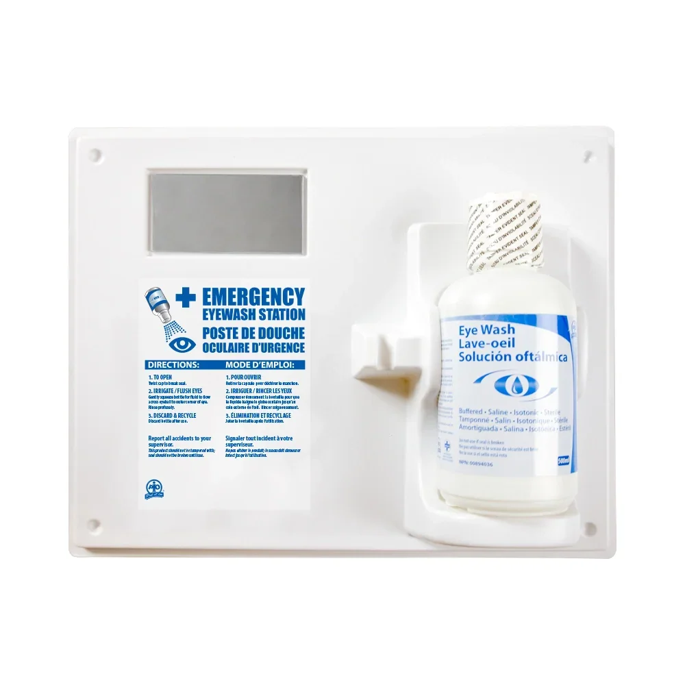 Wall-mounted emergency eye wash station kit with saline solution bottle and bilingual instructions