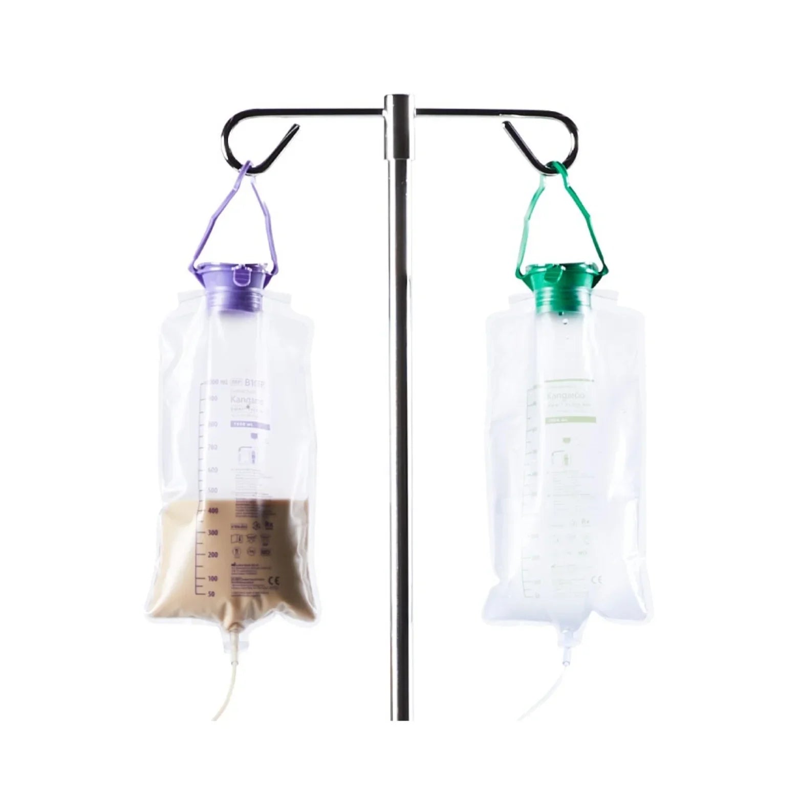 Two medical feeding bags hanging on an IV pole, one with brown liquid, used for enteral feeding.