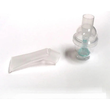 Clear plastic medical nebulizer mouthpiece and chamber on white background