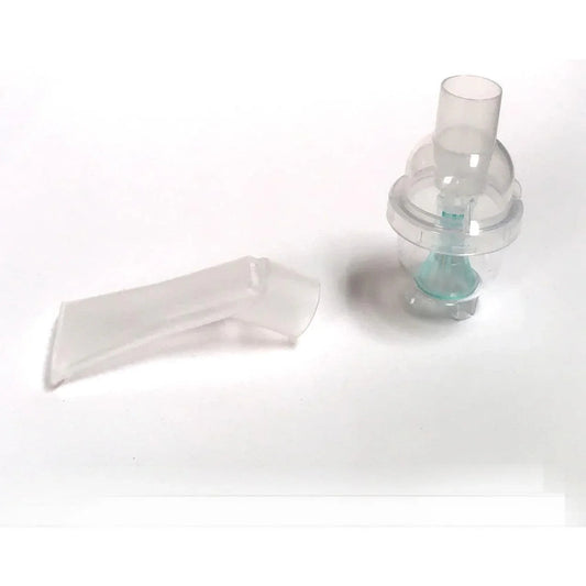 Clear plastic medical nebulizer mouthpiece and chamber on white background